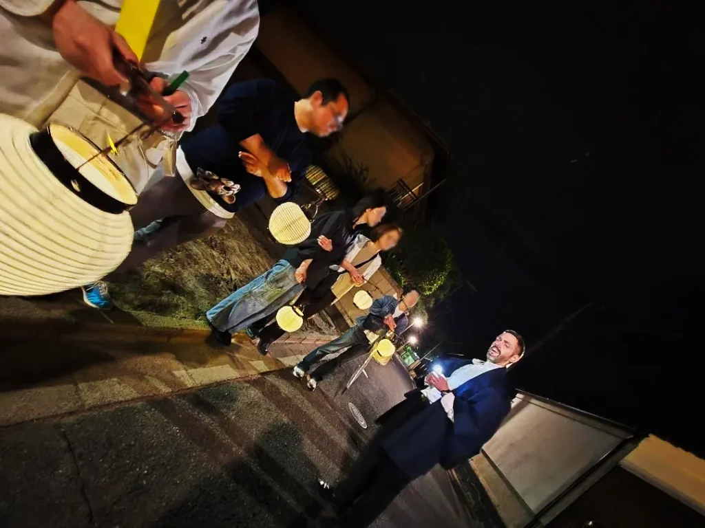 Participants and Guide holding lanterns during the Nara Ghost Tour